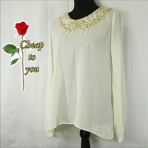 ING LONG SLEEVE TOP. SIZE LARGE